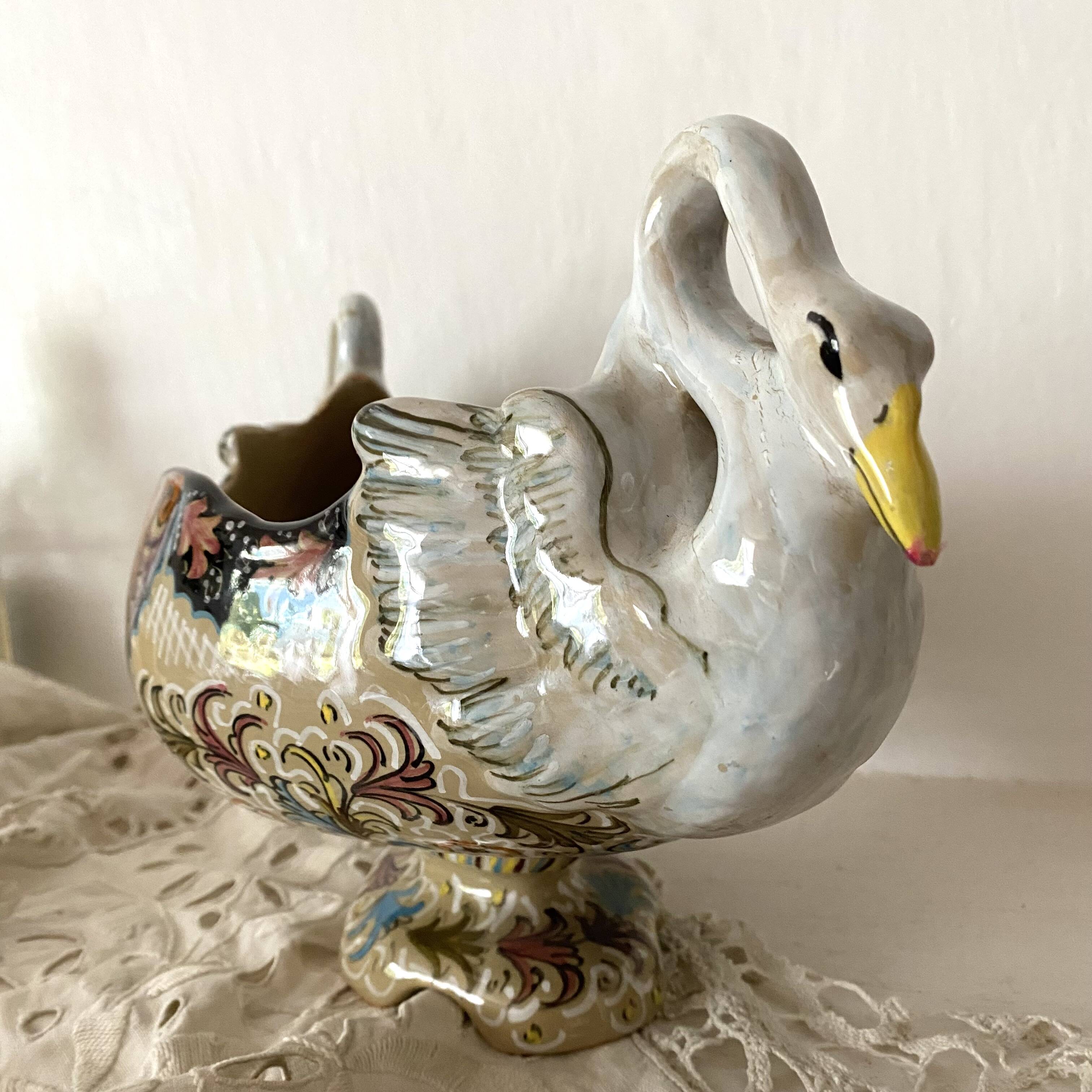 Molaroni planter, Pesaro, Italy, swans
