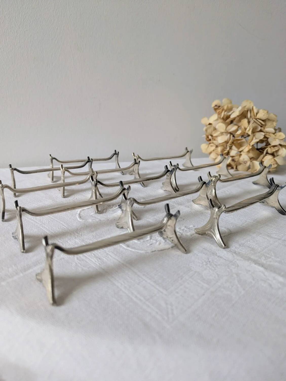 Set of 12 Christofle knife rests, Moderne 1912 model