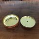 Metal candy box with gold interior wood effect