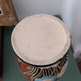 Large vintage antique vase with raised floral pattern.