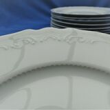Set of 10 white Limoges flat plates