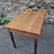 Vintage pine table with drop-leaf extension and turned beech legs, France, 1930s.
