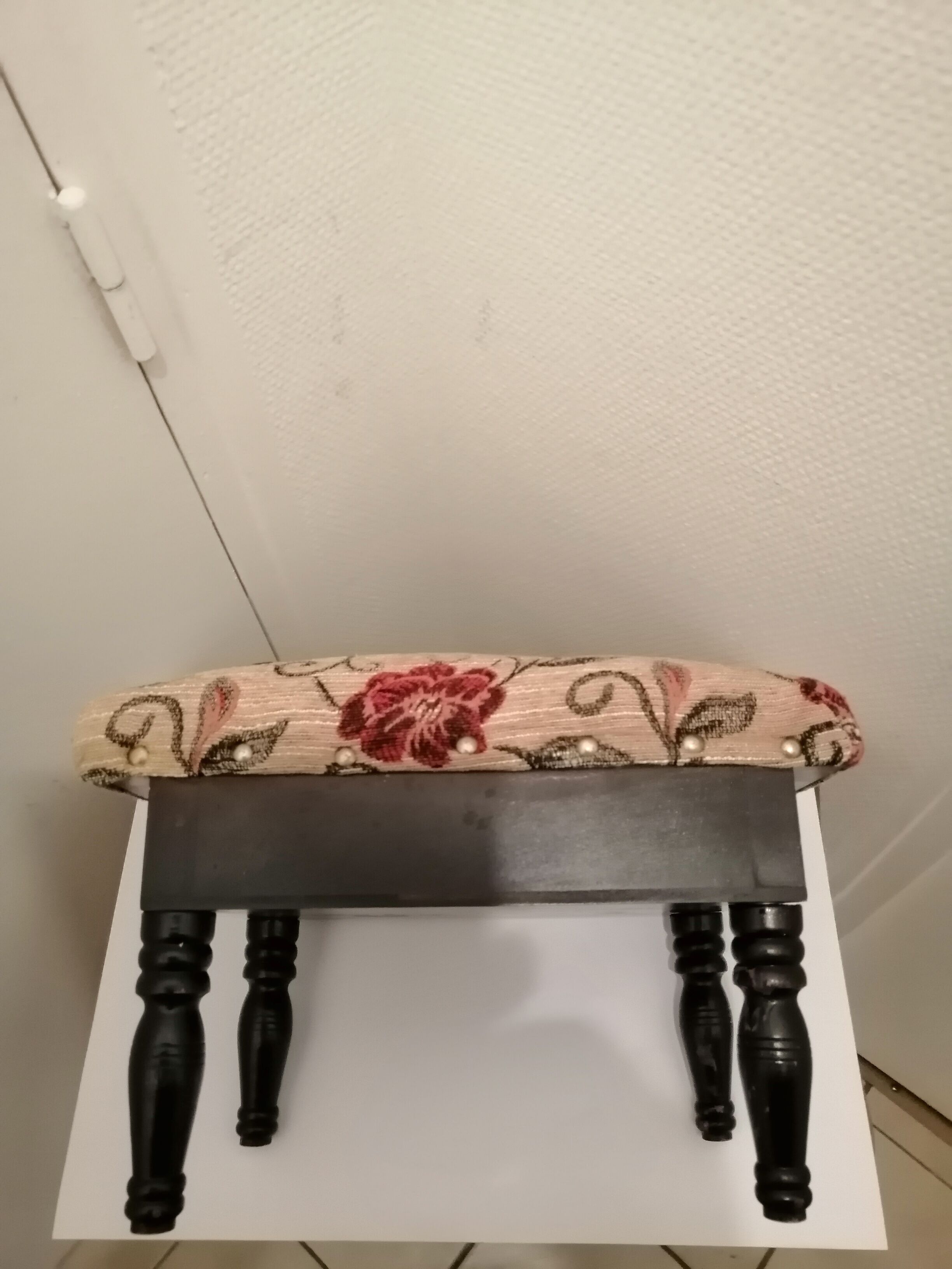 Antique footrest stool in wood and fabric