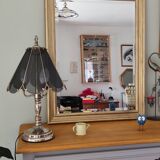 Large gold-framed mirror with bevelled glass.