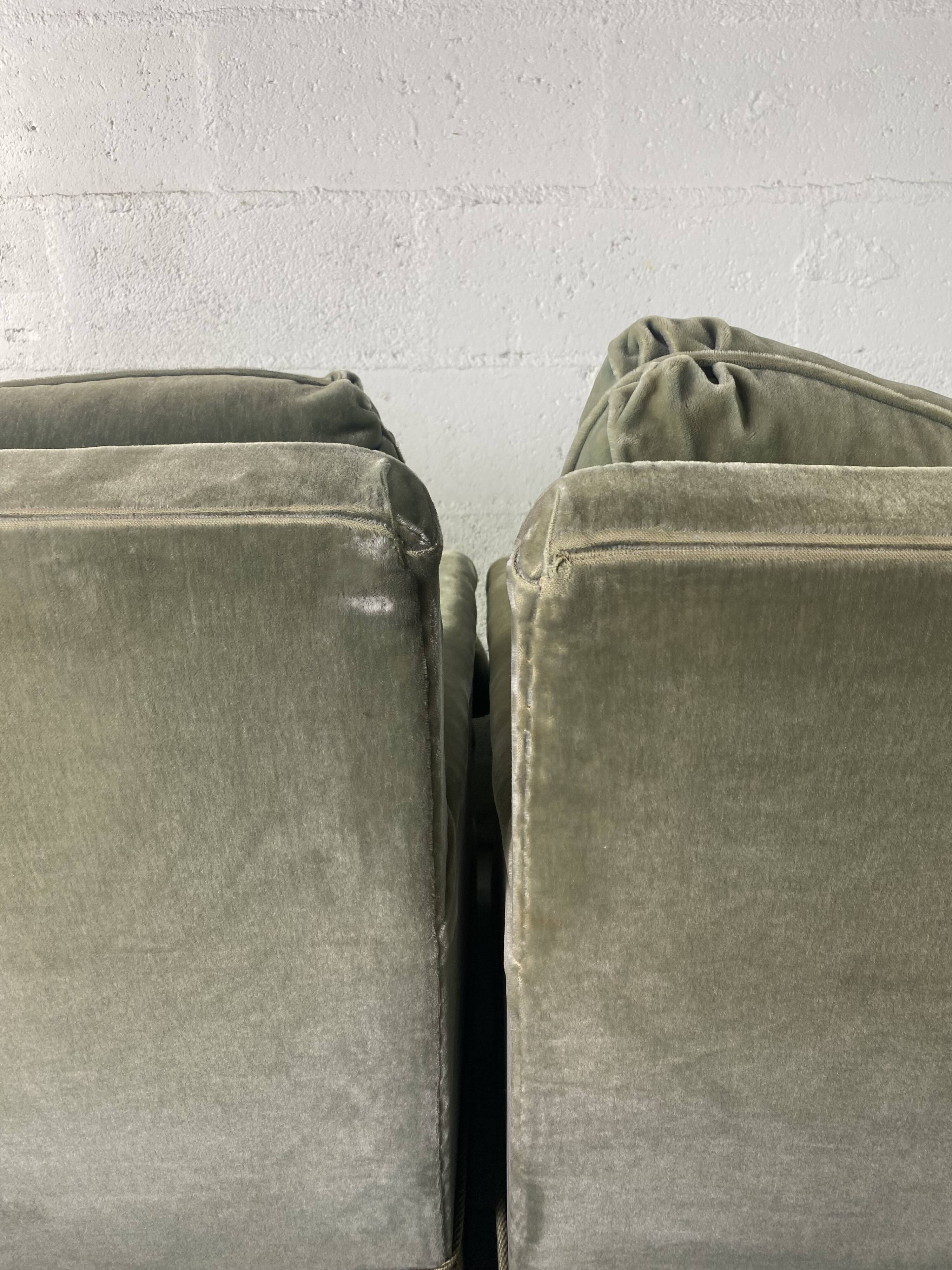 Pair of green velvet club armchairs