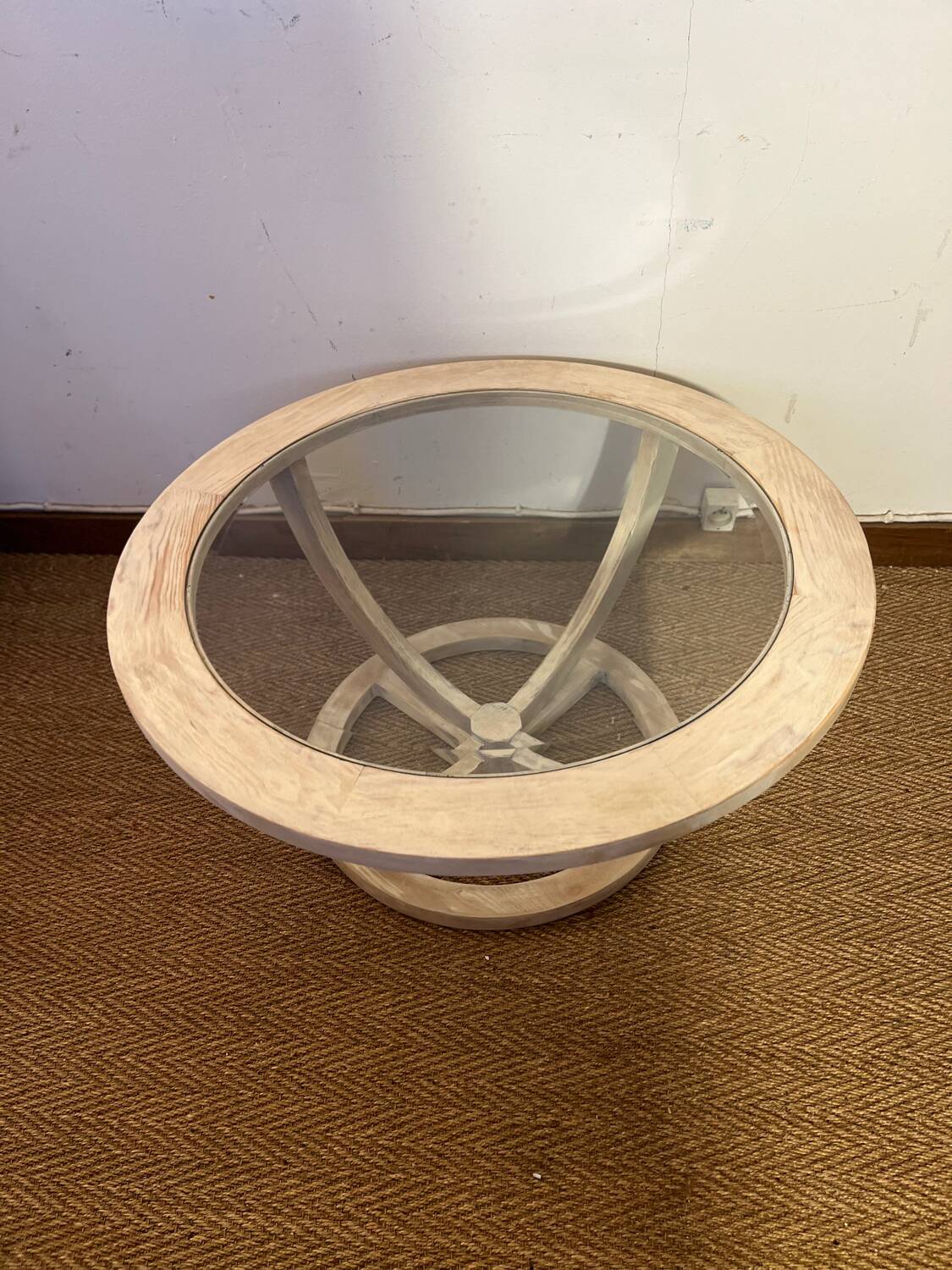 Oval patinated wood and beveled glass coffee table