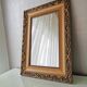 Beautiful French vintage mirror in gilded wood from the 60s