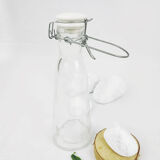 Glass bottle with clasp