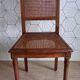 Art Deco caned chair with bronze ornaments.