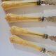 English fish knives in silver and ivory, 19th century