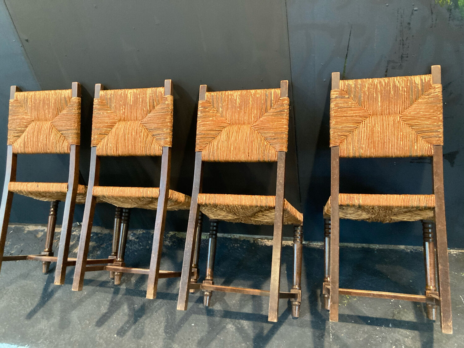 Four straw chairs