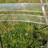 2 invisible folding chairs in metal and transparent plexiglass