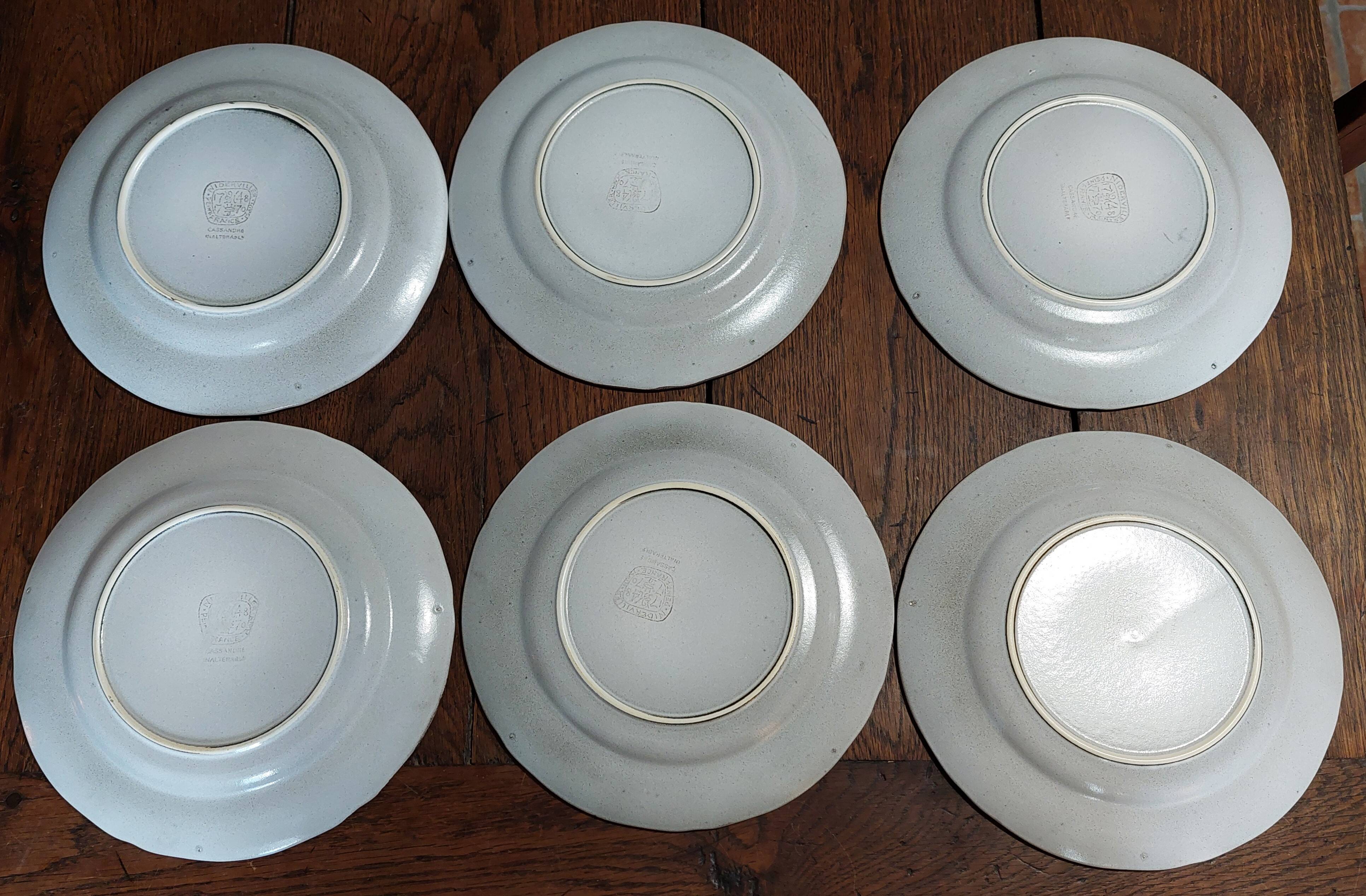 Flat plates series of six Niderviller stoneware, 20th century Cassandre decoration