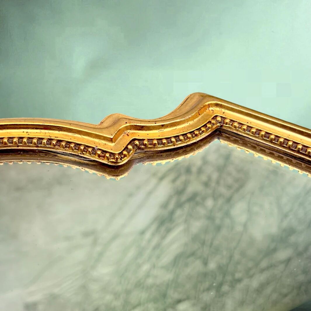 Large wall mirror in gilded resin – neoclassical style – 1970s