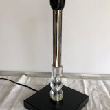 Silver floor lamp with a straight shade.