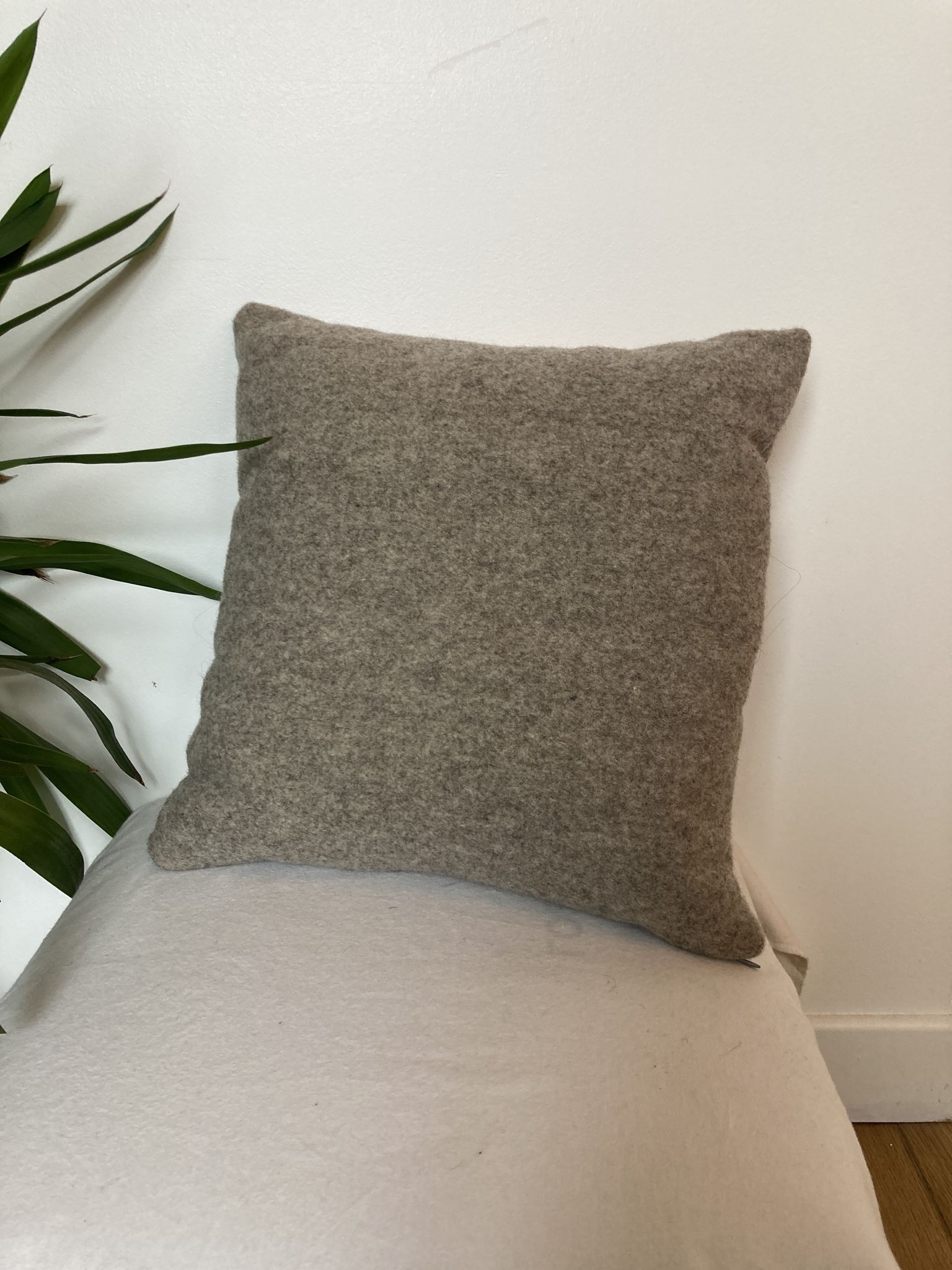 Bi-sided cushion gray wool yoke orange fabric