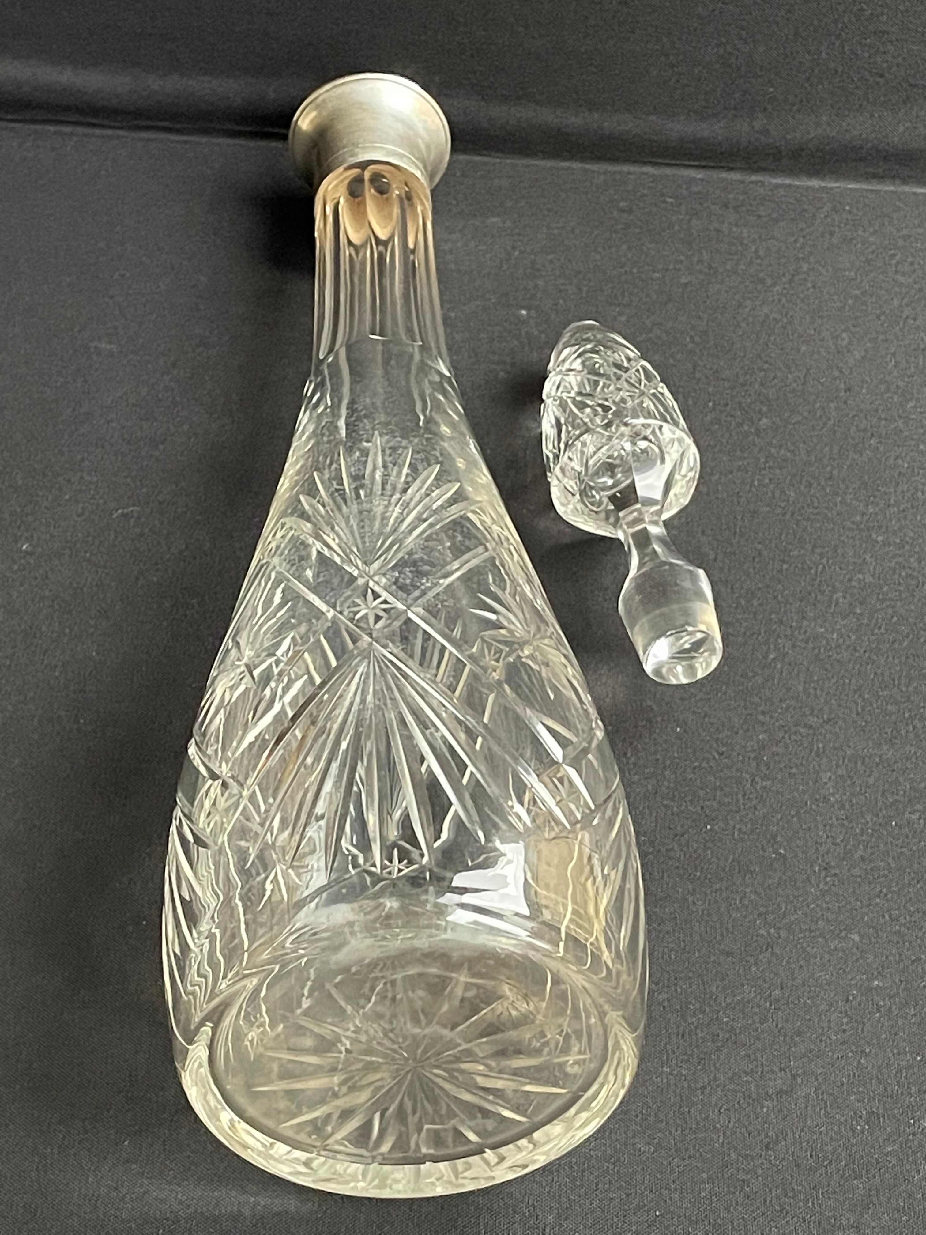 Blown crystal decanter, cut and silver collar