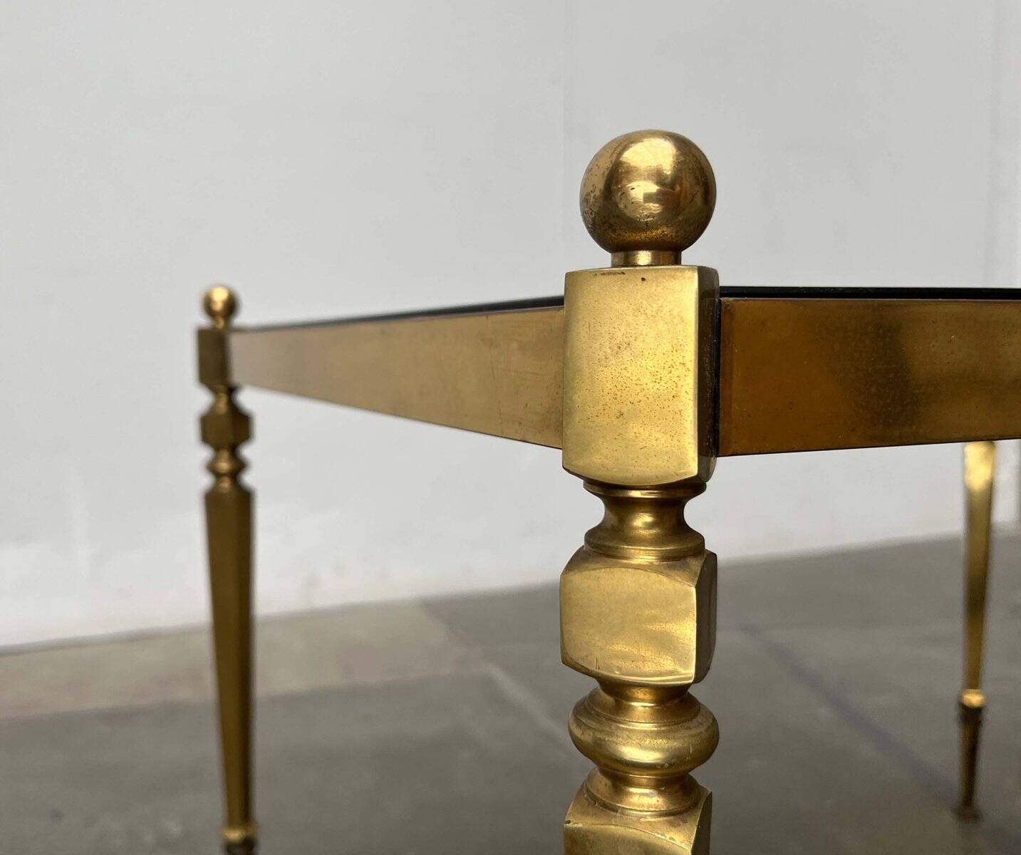 Mid-century German Hollywood neoclassical brass and glass side table from the 1950s.