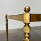 Mid-century German Hollywood neoclassical brass and glass side table from the 1950s.
