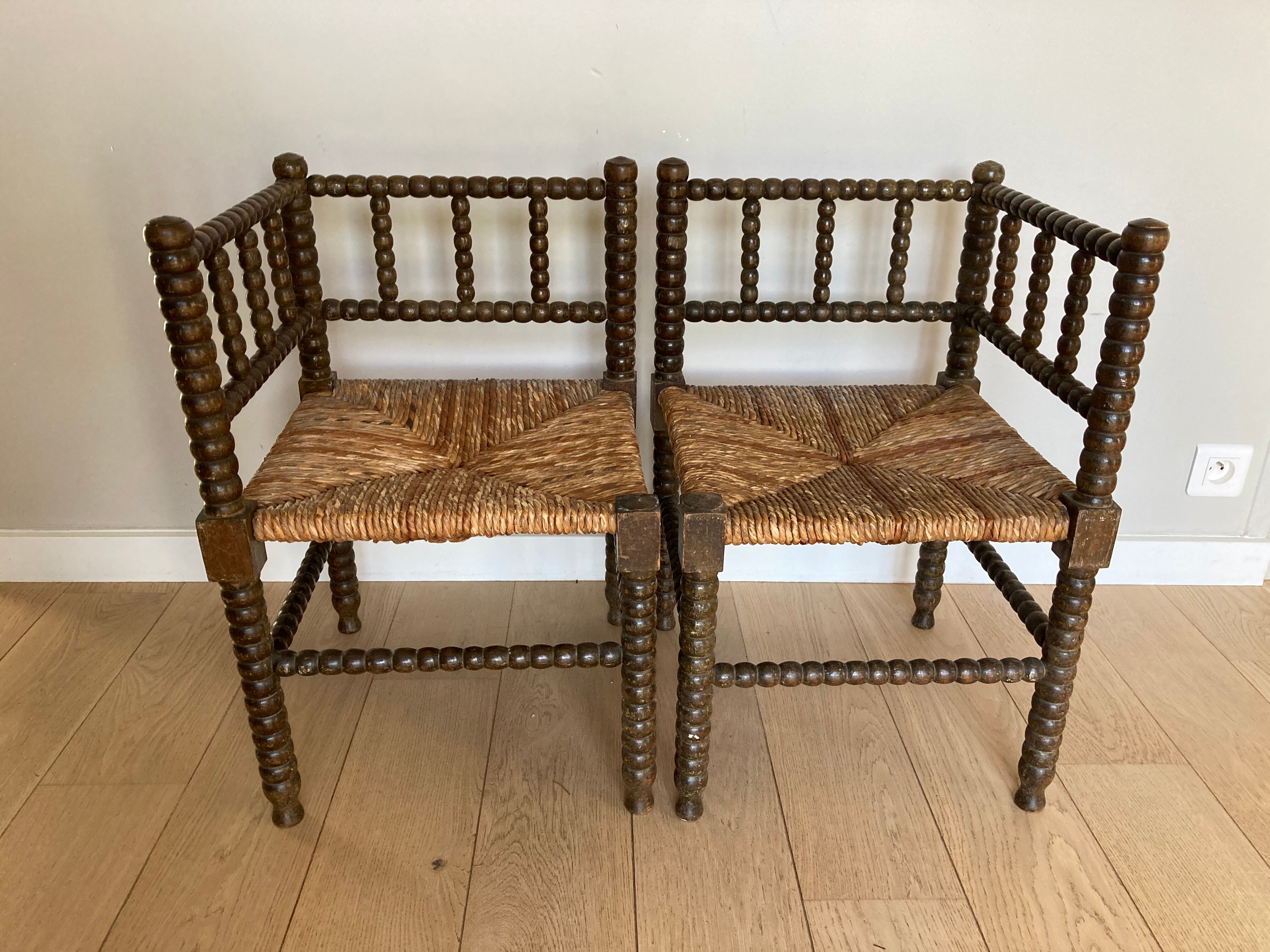 Turned wood corner armchairs