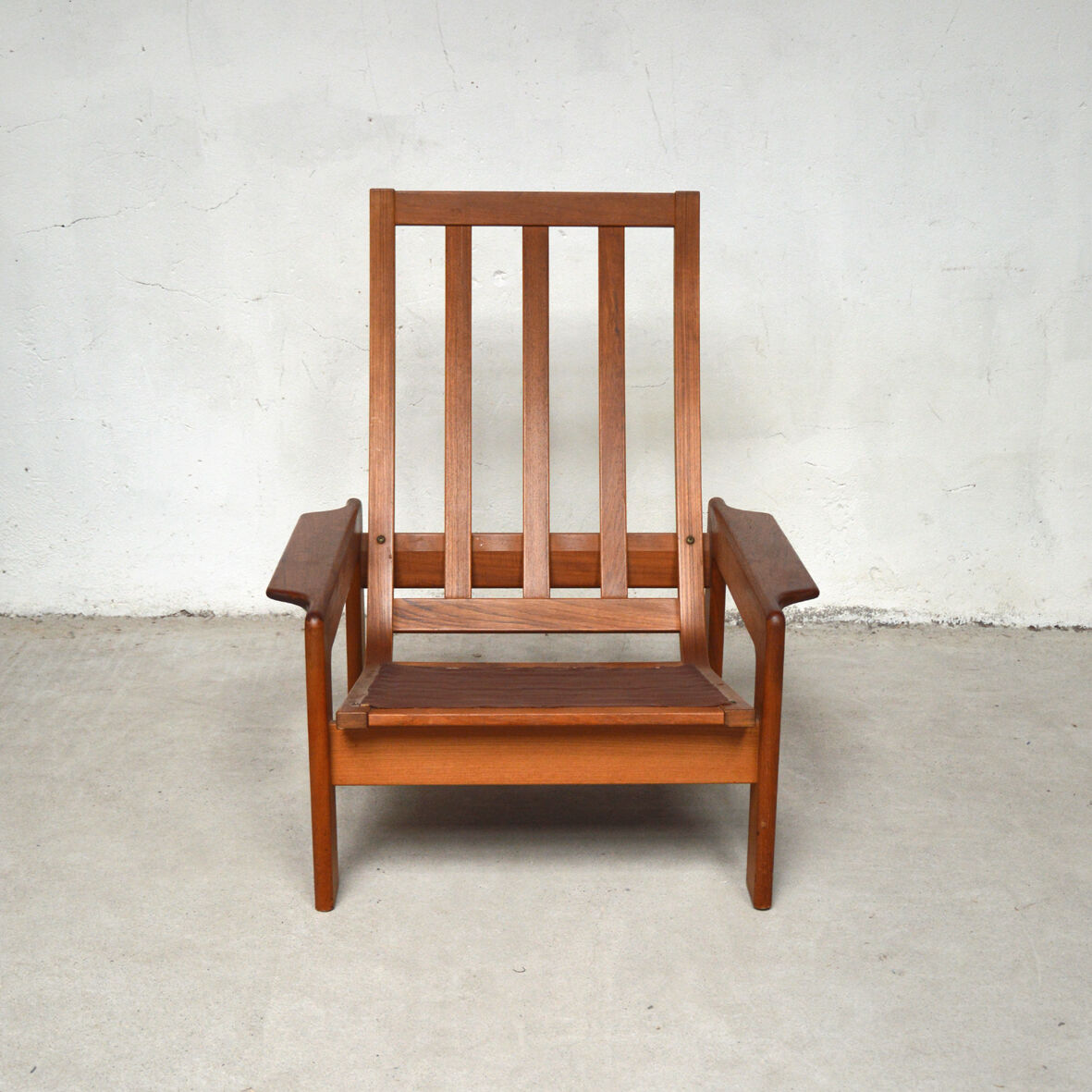 Pair of Danish teak armchairs and footrests, 1960