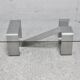 Coffee table with "kinetic" steel base and glass slab. Circa 1970.