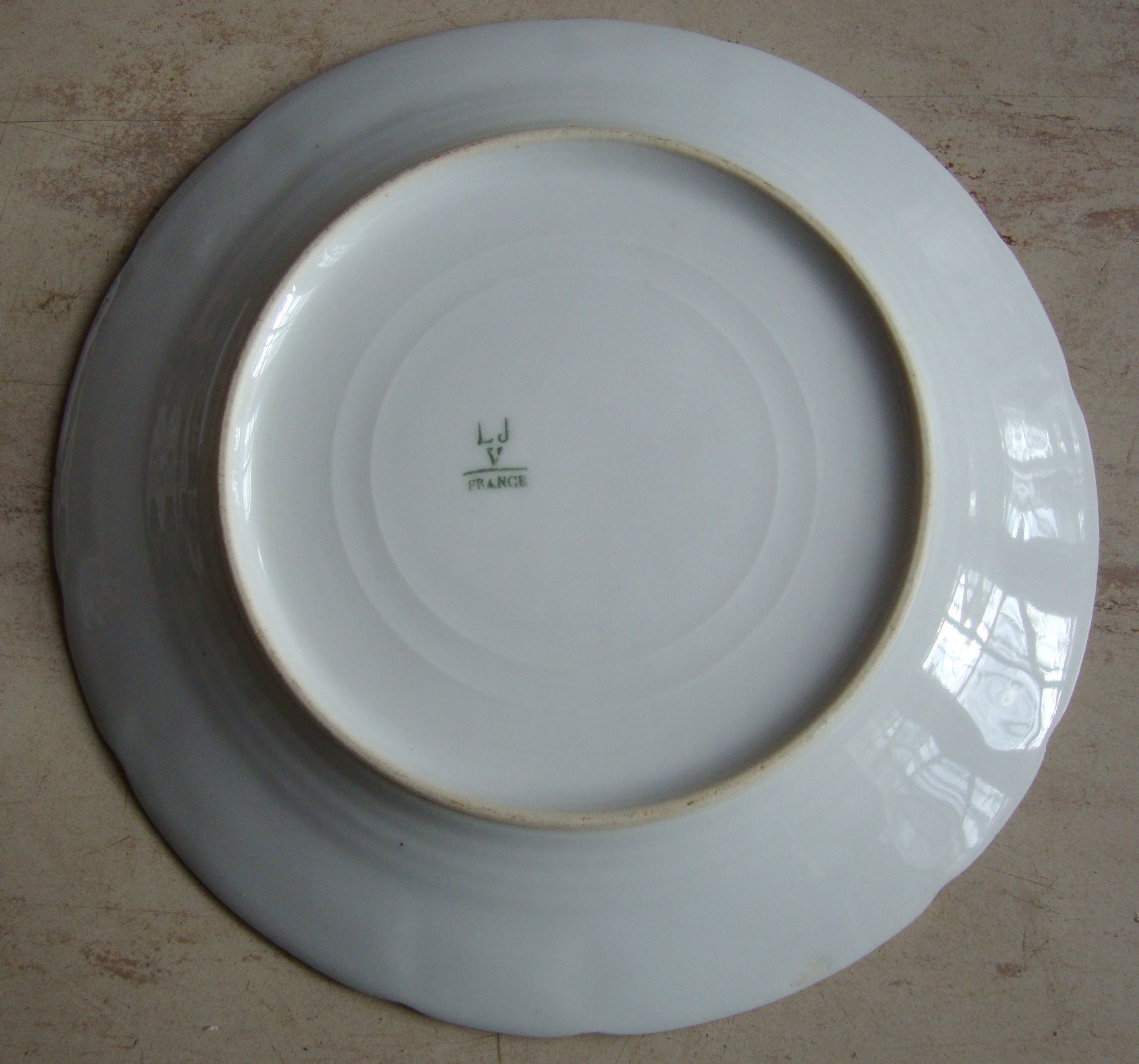 Set of 5 antique Limoges porcelain plates L.J.V with fruit decoration