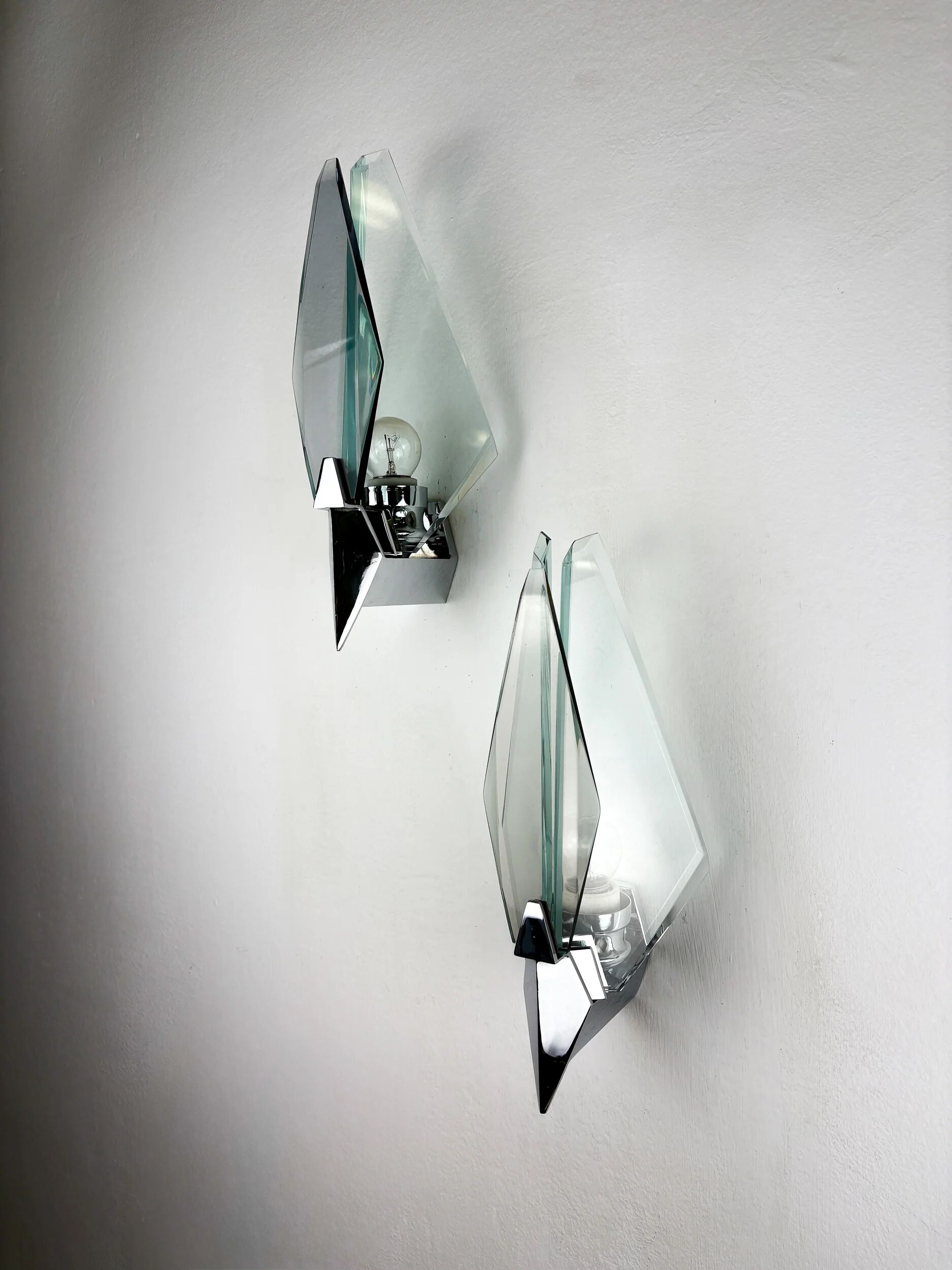 Pair of Veca sconces, Murano blue cut glass & black lucite, Italy, circa 1970s