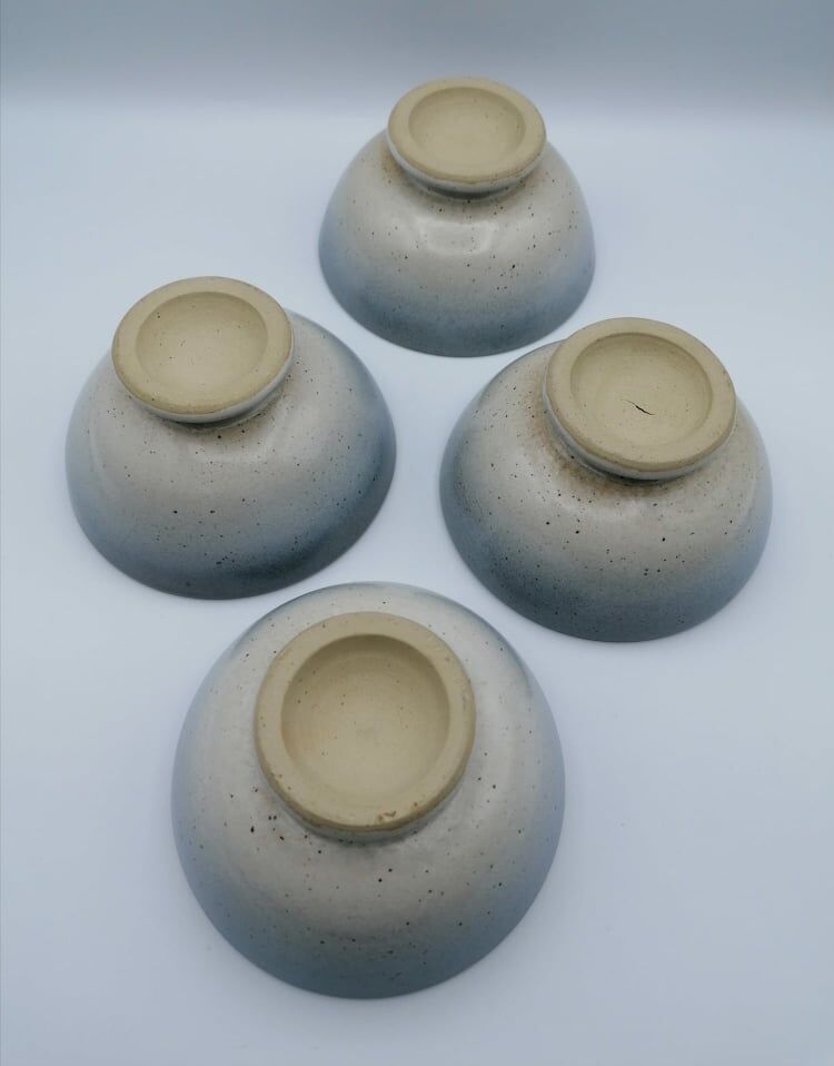 Four bowls in midnight blue sandstone