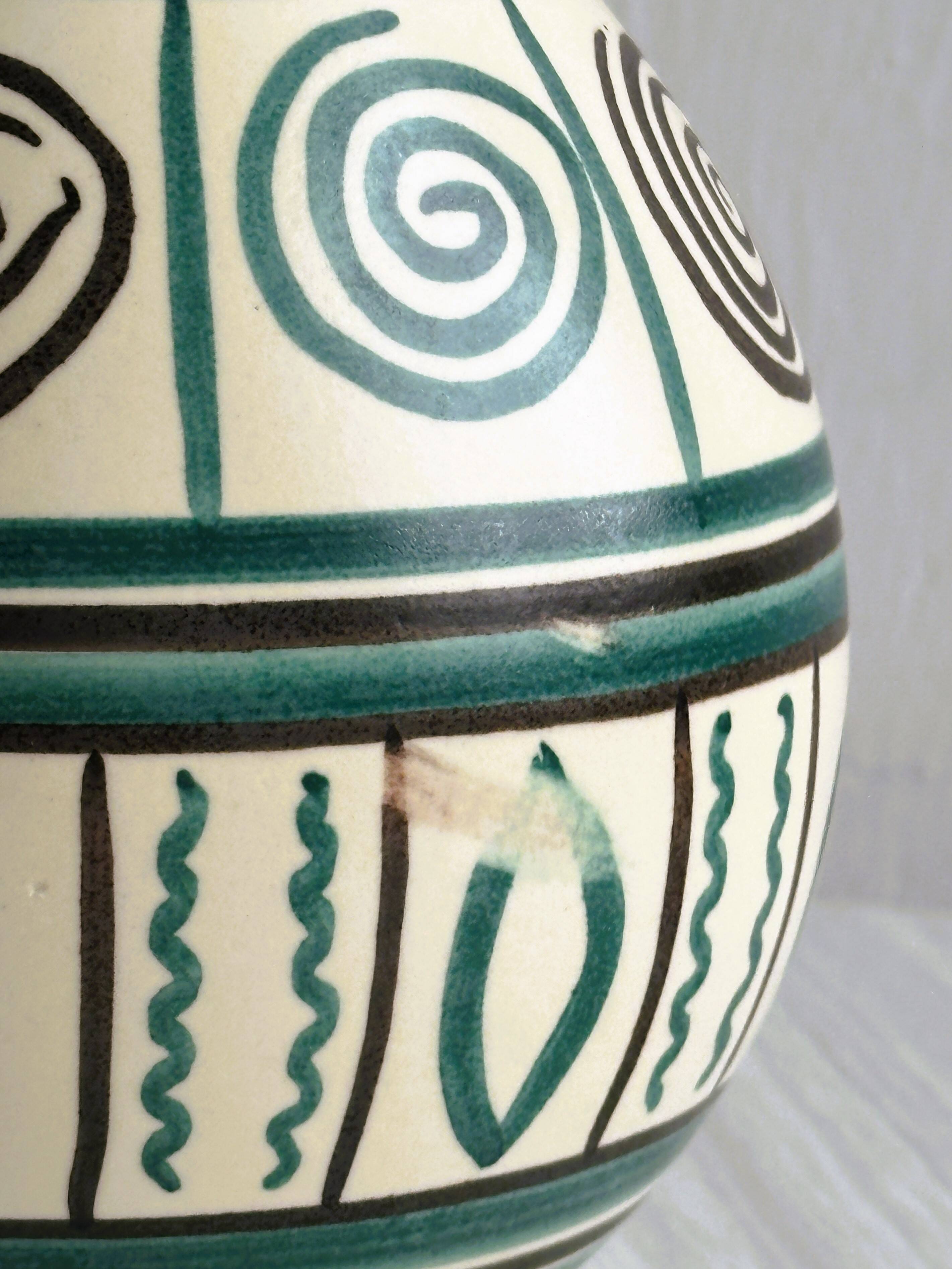 Old handmade ceramic vase, Punter style geometric ornaments.