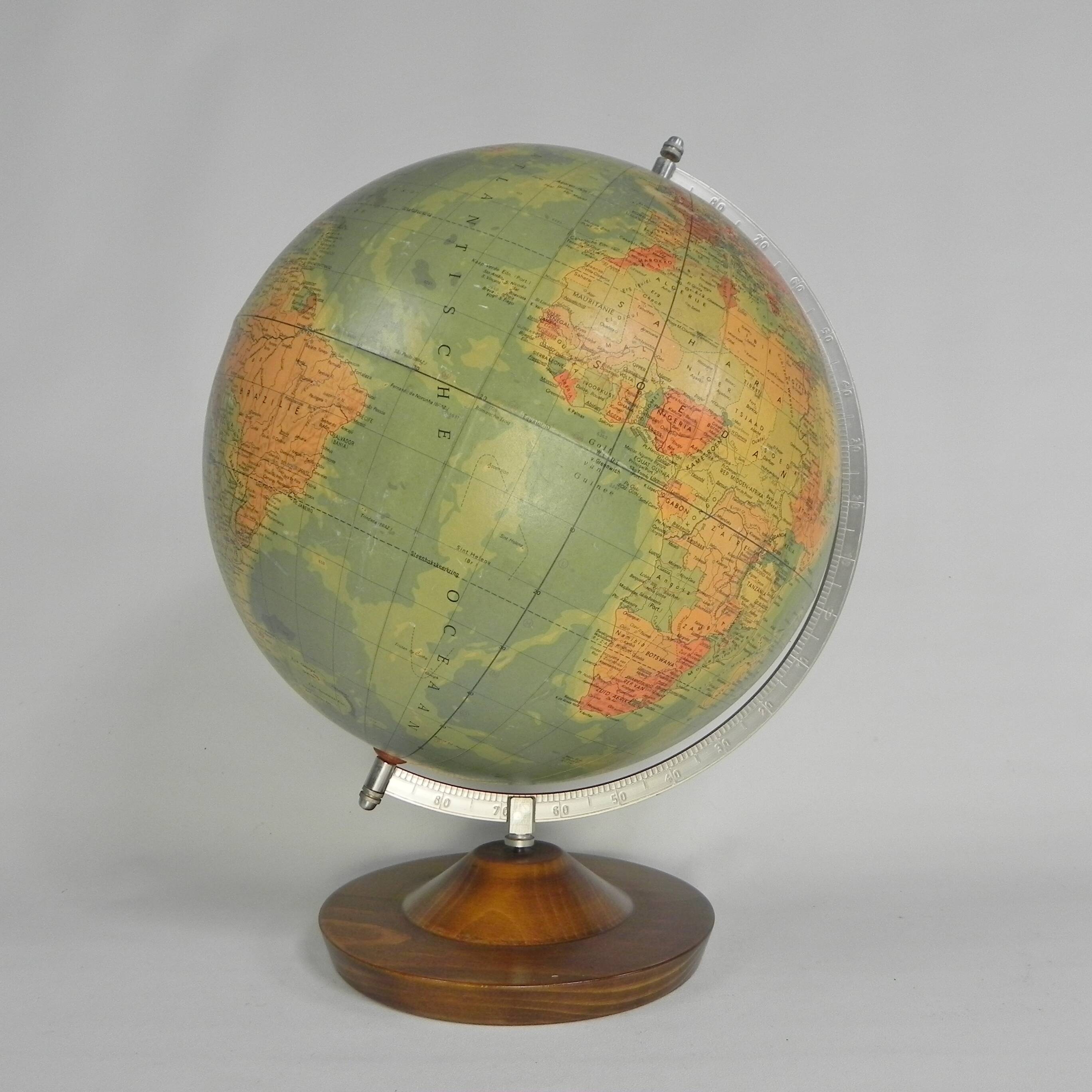Paper mache globe on a wooden base, 1975