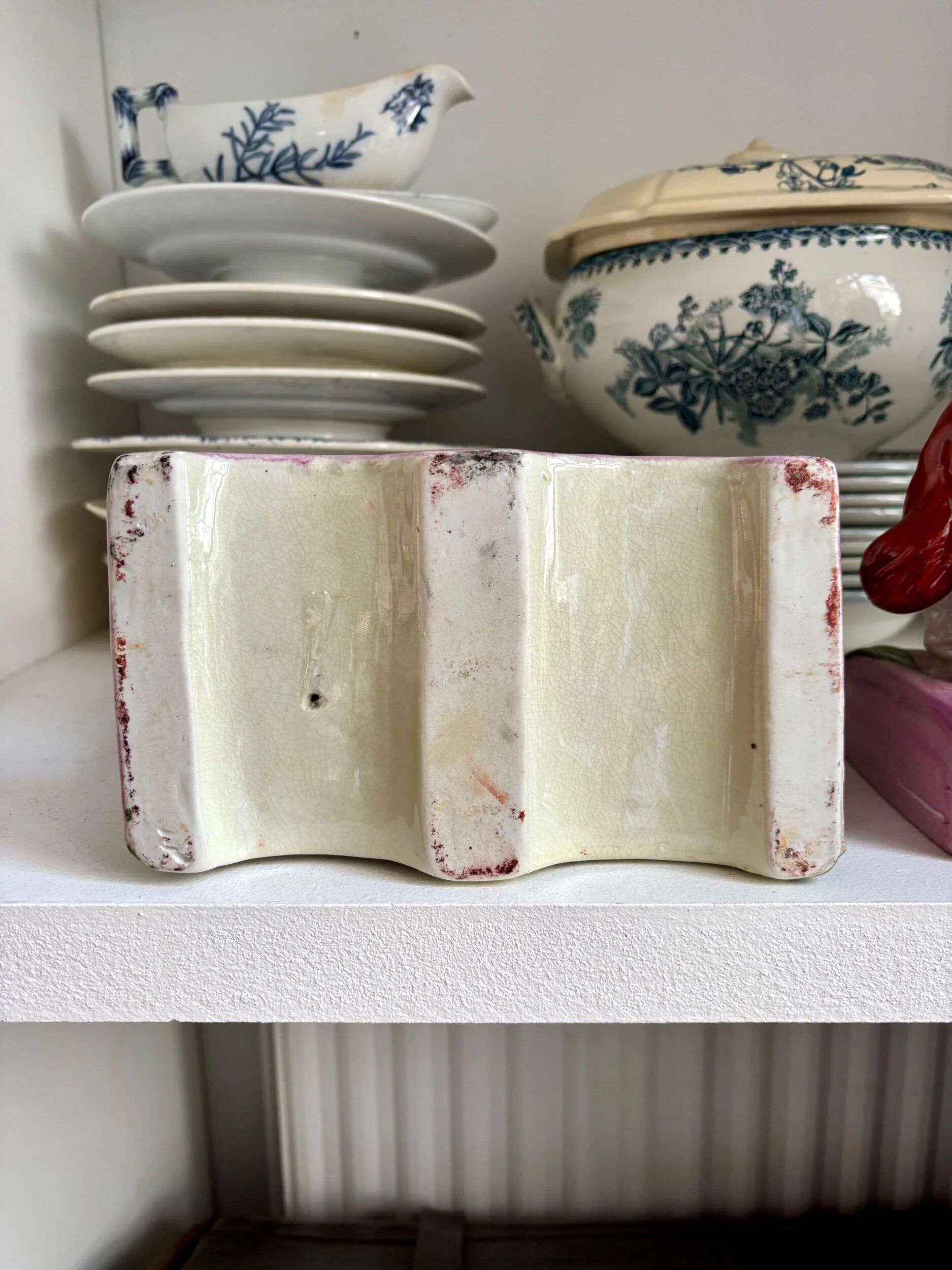 Pair of Staffordshire porcelain Cavalier King Charles dogs on terrace, 19th century.