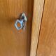 Vintage 1960s wooden wardrobe with tapered legs.