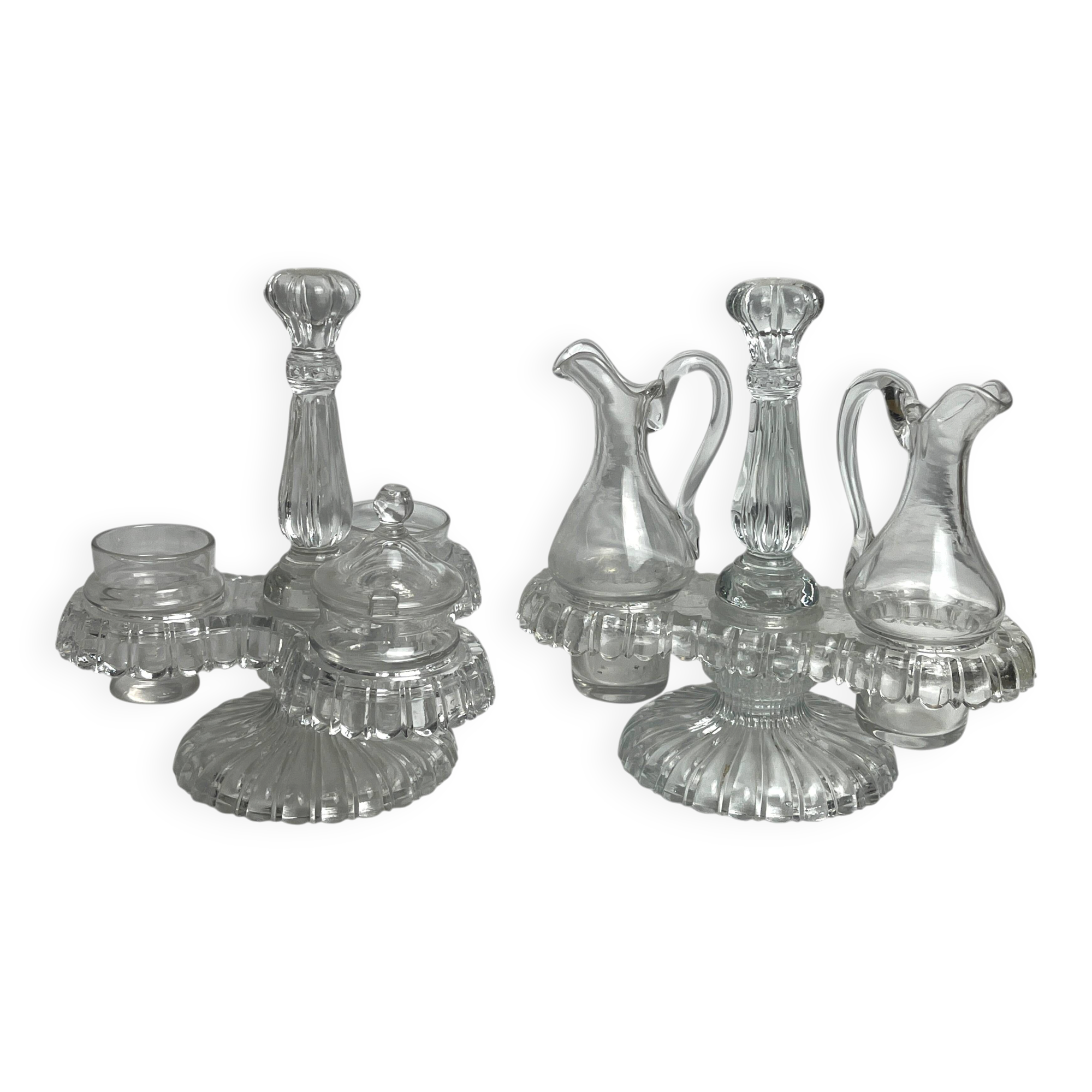 Tableware, two moulded glass table servants from the early 20th century.