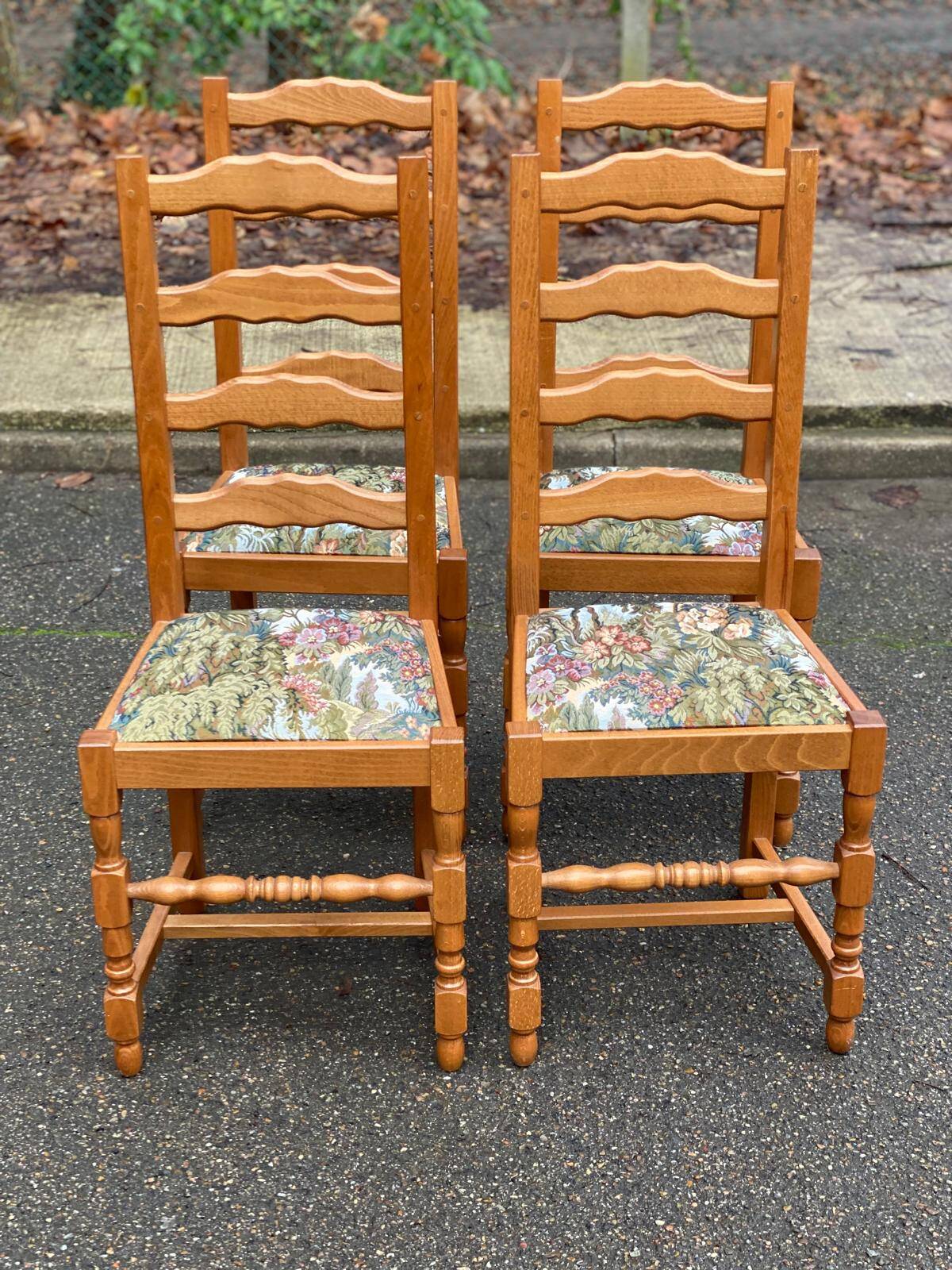 4 solid wood chairs with embroidered fabric