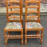 4 solid wood chairs with embroidered fabric