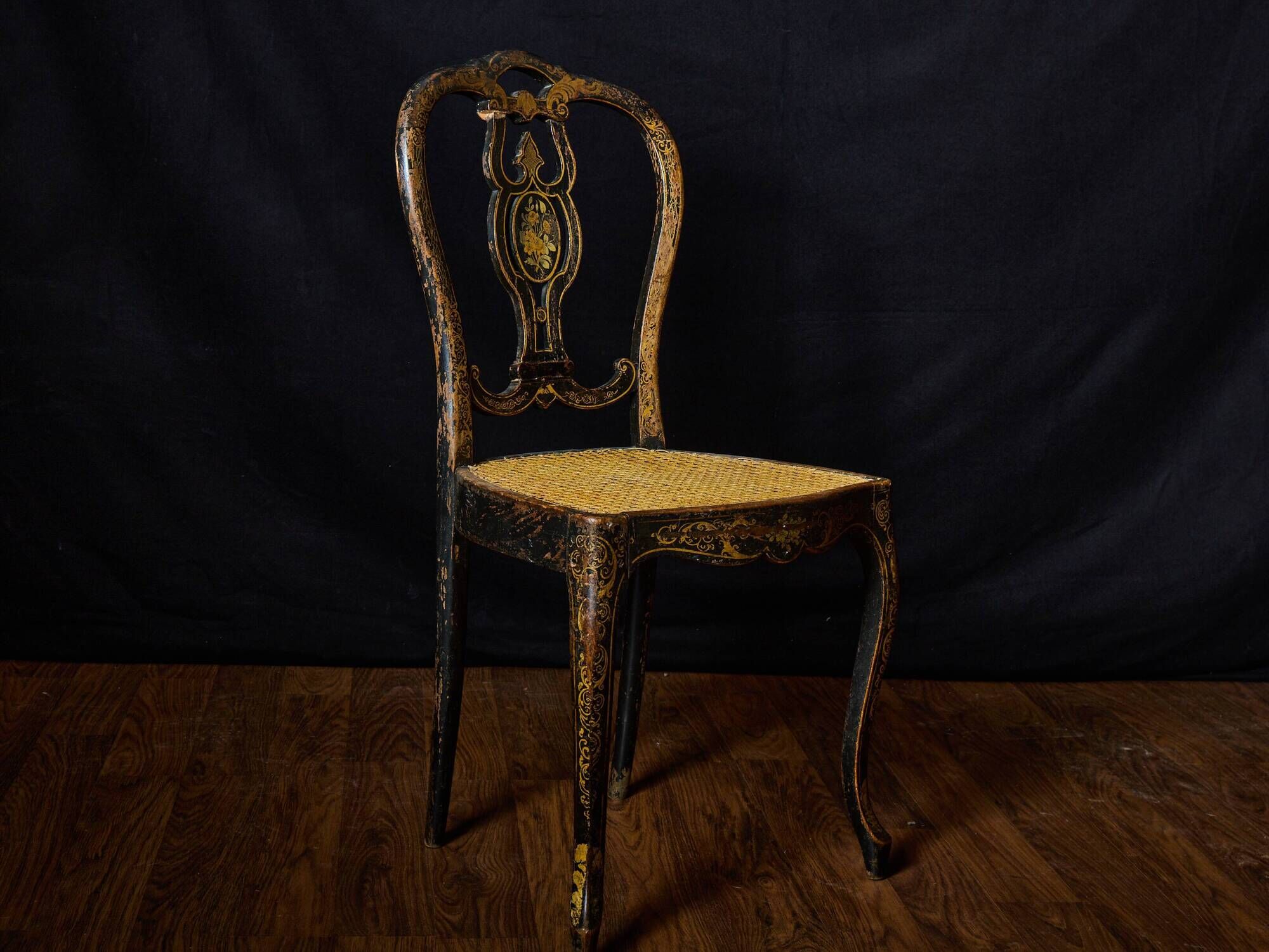 Antique black and gold lacquered chair – Napoleon III style – caned seat