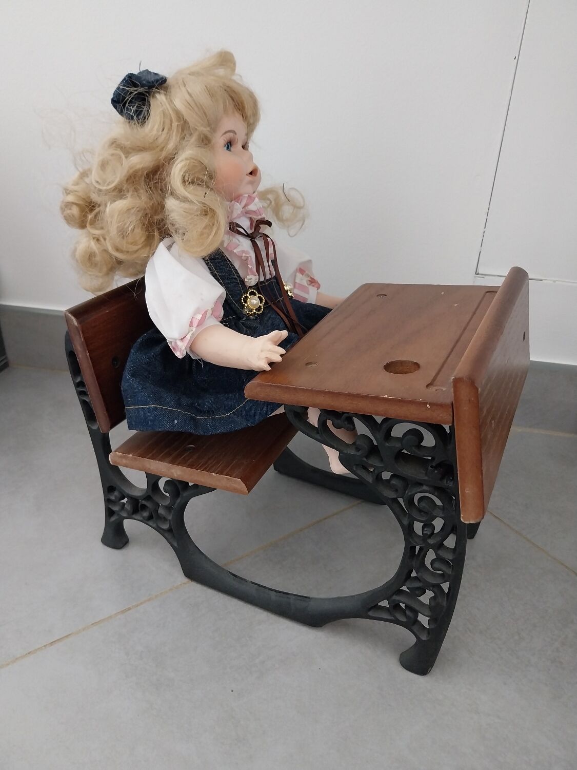 Wooden swing desk and porcelain dolls