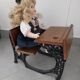 Wooden swing desk and porcelain dolls