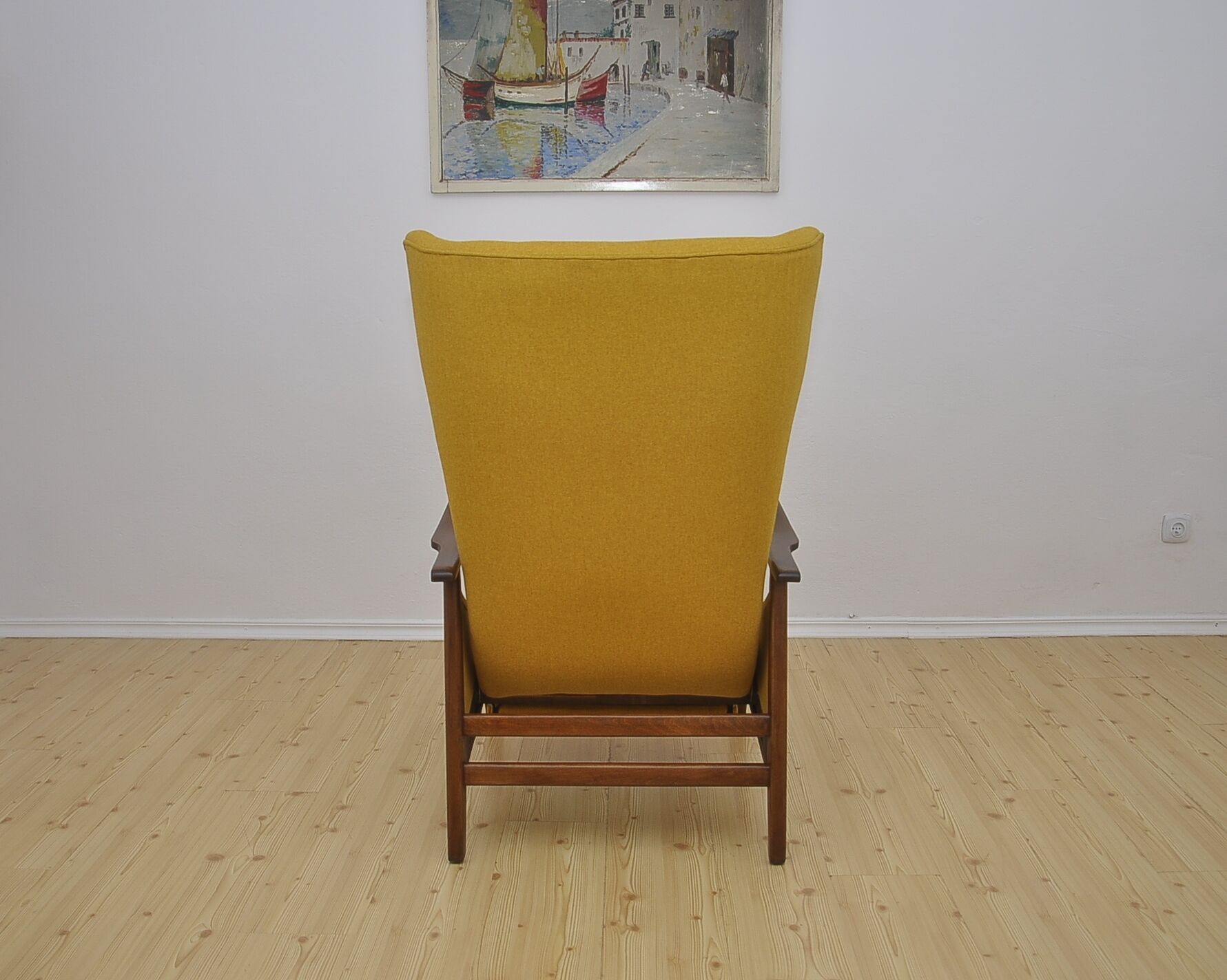 Mid-century Wingback armchair with folding footrest, 1960s