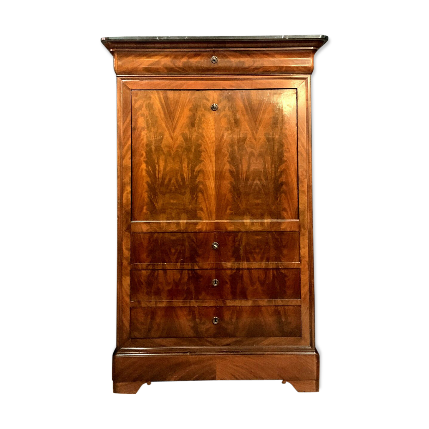 Writing desk a doucine era Louis Philippe in mahogany.