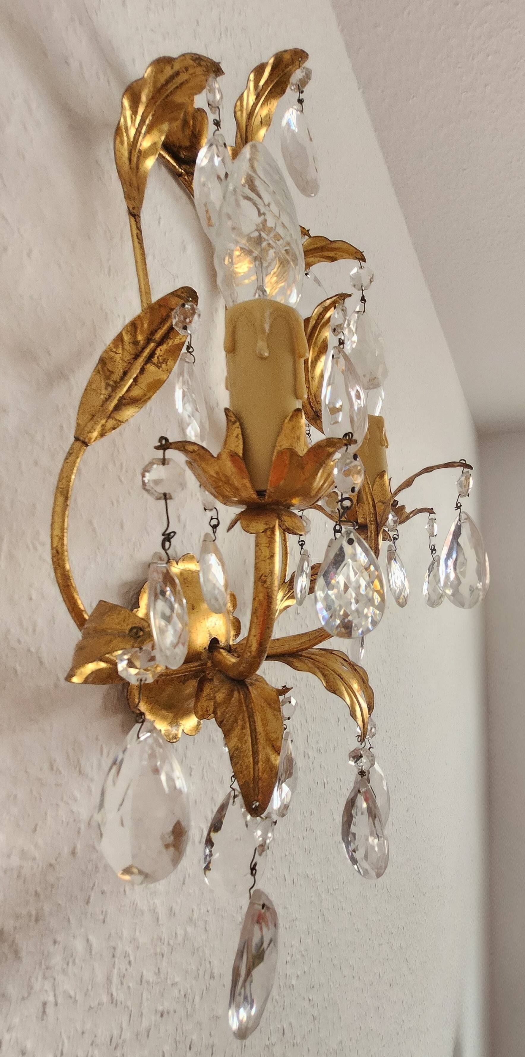 Hand-forged wall lamp gilded with gold leaf and crystals, Italy
