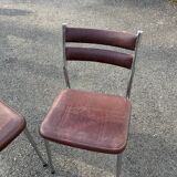 Pair of retro metal and leather chairs
