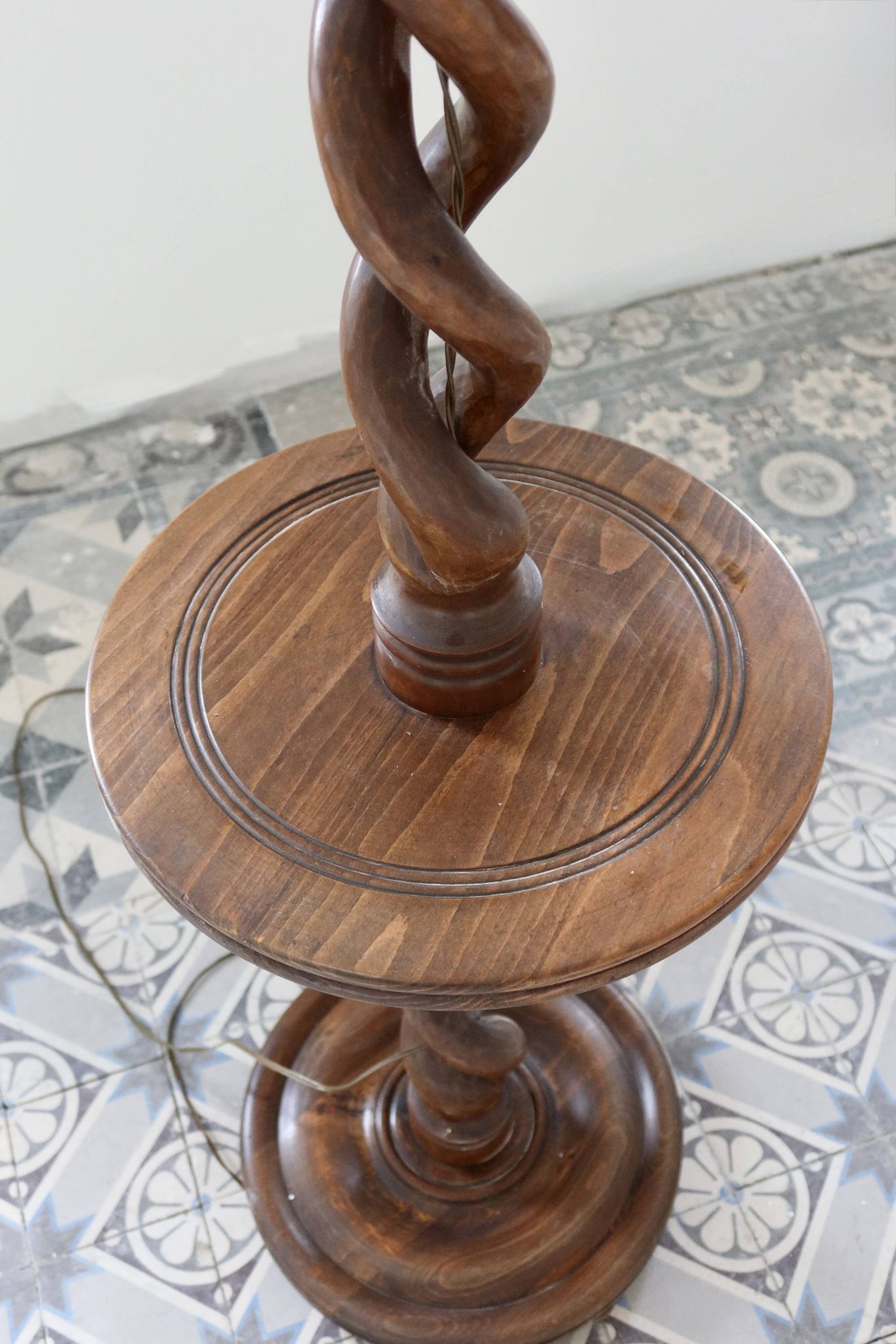 Vintage twisted turned wooden lamp base with shelf.