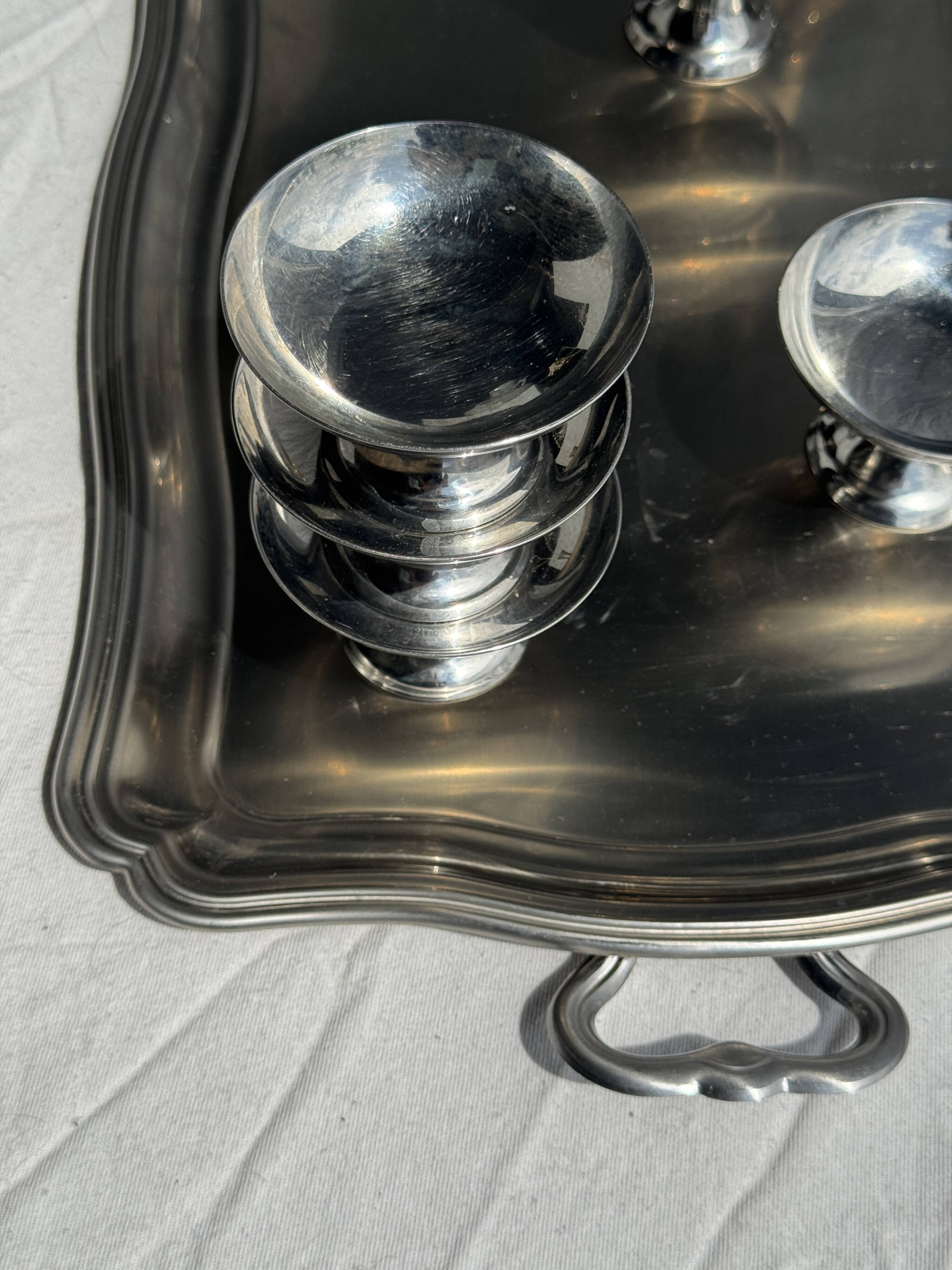 Guy Degrenne silver stainless steel serving tray with an eventful shape
