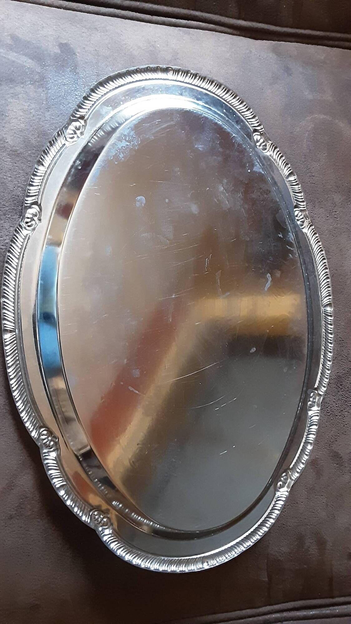 Oval metal plate