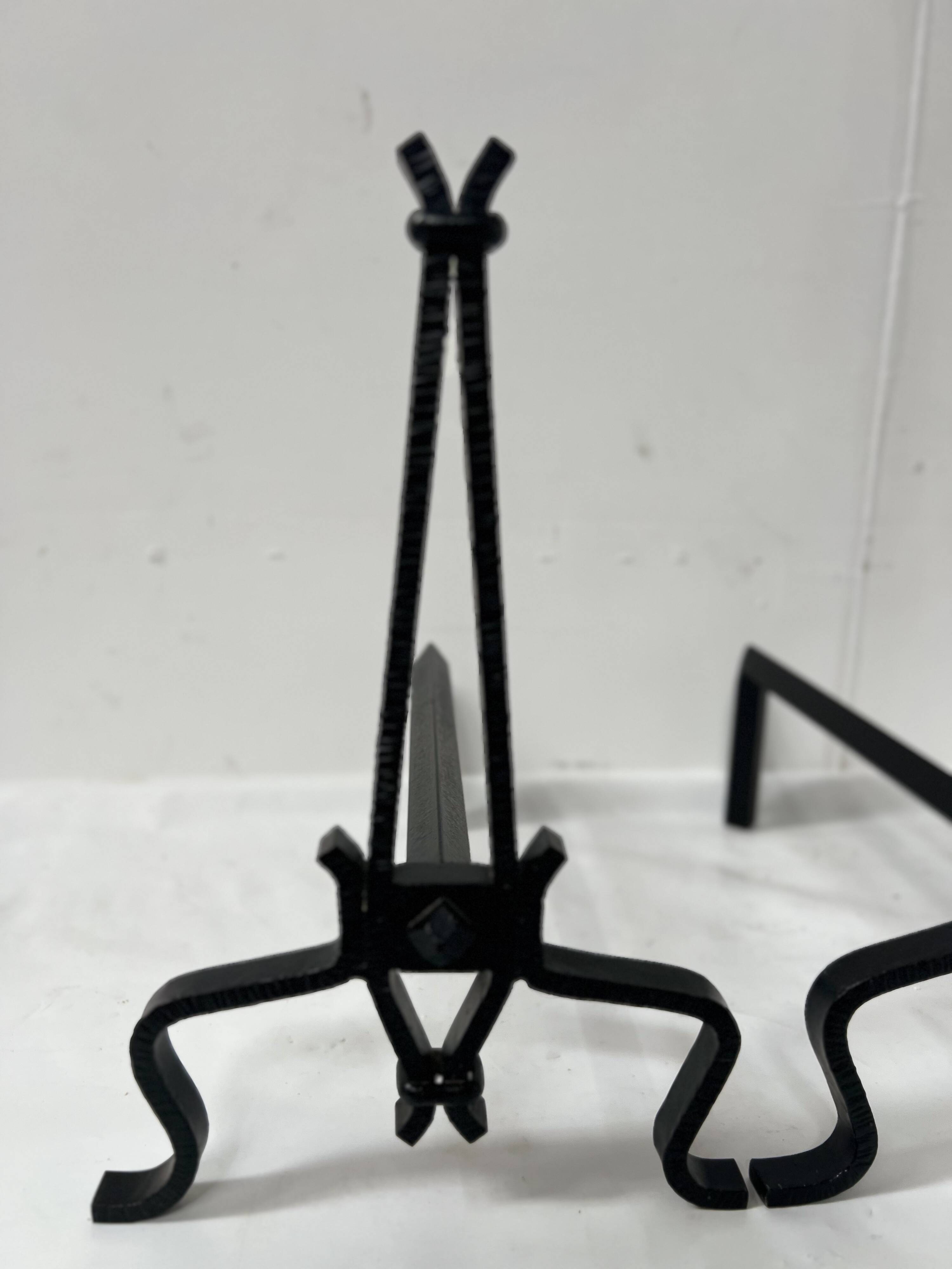 Pair of wrought and hammered iron bedside tables, 20th century