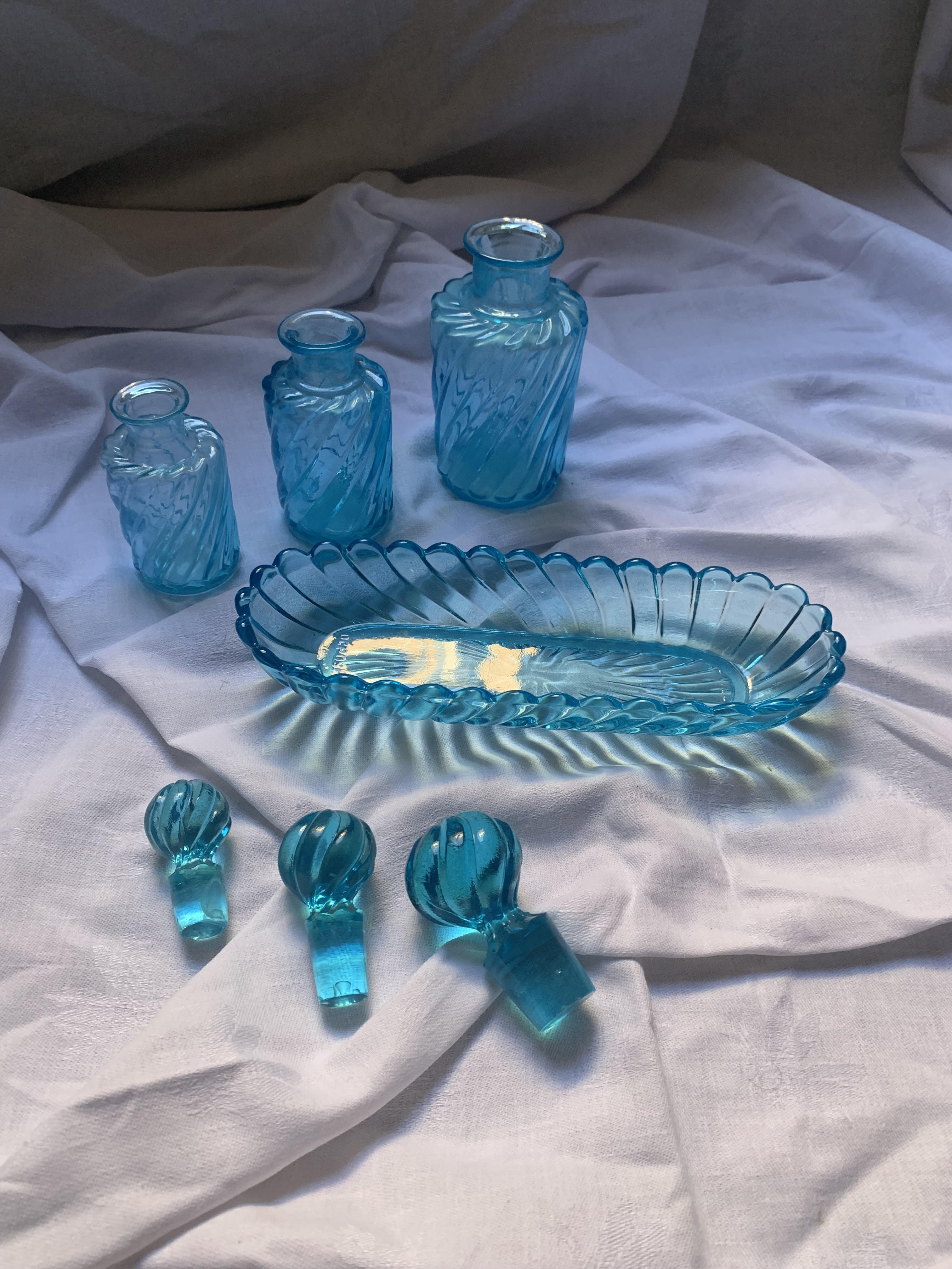 Toiletries and vintage blue glass bottles