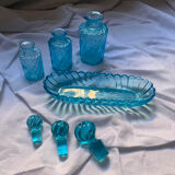 Toiletries and vintage blue glass bottles