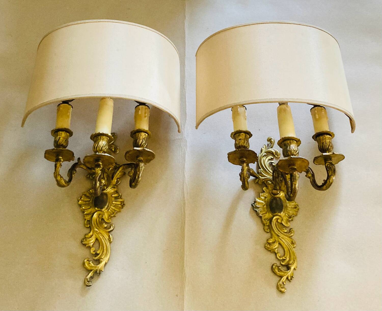 Louis XV gilt bronze wall lights from the 19th century with lampshades